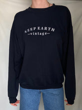Load image into Gallery viewer, Upcycled Vintage Black Oversized Sweatshirt with White Keep Earth Vintage Embroidered Logo