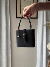 Load image into Gallery viewer, Vintage Parisian Black Box Belt Handbag with French Gold Tone Eiffel Tower Charm Sourced from France Black Gold Tassel Fringe