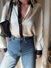 Load image into Gallery viewer, Vintage Deadstock Silk Ivory White Satin Oversized Button Up Blouse Black Collar and Sleeve Cuffs
