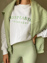 Load image into Gallery viewer, Upcycled Vintage Oversized White Long Sleeve Sweatshirt Pale Mint Green Keep Earth Vintage Logo

