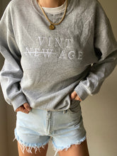 Load image into Gallery viewer, Upcycled Heather Grey Sweatshirt: Vintage Embroidered Logo, Made in USA

