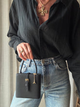 Load image into Gallery viewer, Vintage Parisian Black Box Belt Handbag with French Gold Tone Eiffel Tower Charm Sourced from France Black Gold Tassel Fringe
