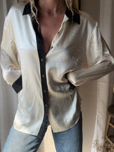 Load image into Gallery viewer, Vintage Deadstock Silk Ivory White Satin Oversized Button Up Blouse Black Collar and Sleeve Cuffs

