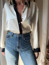 Load image into Gallery viewer, Vintage Deadstock Silk Ivory White Satin Oversized Button Up Blouse Black Collar and Sleeve Cuffs
