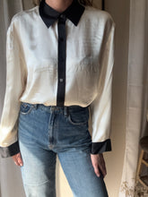 Load image into Gallery viewer, Vintage Deadstock Silk Ivory White Satin Oversized Button Up Blouse Black Collar and Sleeve Cuffs
