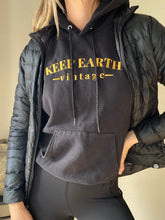 Load image into Gallery viewer, Upcycled Vintage Black Hoodie Sweatshirt Gold Keep Earth Vintage Logo
