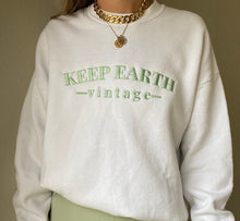 Load image into Gallery viewer, Upcycled Vintage Oversized White Long Sleeve Sweatshirt Pale Mint Green Keep Earth Vintage Logo

