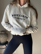 Load image into Gallery viewer, Upcycled Vintage Beige Oversized Hoodie Sweatshirt Black Keep Earth Vintage Logo
