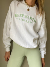 Load image into Gallery viewer, Upcycled Vintage Oversized White Long Sleeve Sweatshirt Pale Mint Green Keep Earth Vintage Logo
