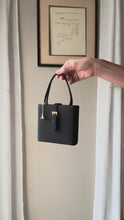 Load and play video in Gallery viewer, Vintage Parisian Black Box Belt Handbag with French Gold Tone Eiffel Tower Charm Sourced from France Black Gold Tassel Fringe
